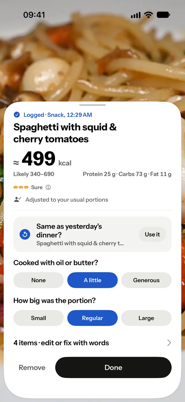 Platelight's result for spaghetti with squid and cherry tomatoes: about 499 kcal, likely 340 to 690, with a question about cooking oil already answered